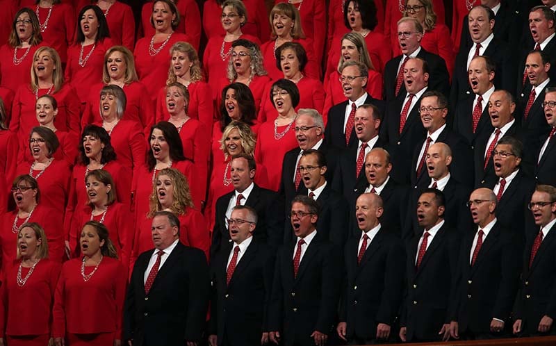 men and women singing in a choir