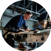 Male BYU student working on robotics