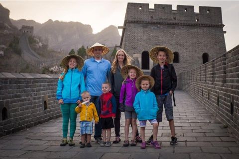 The Hill family walking on the Great Wall of China.