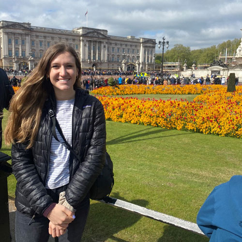 BYU student Kennedy Daniel poses in front of a building while on a study abroad in Europe.