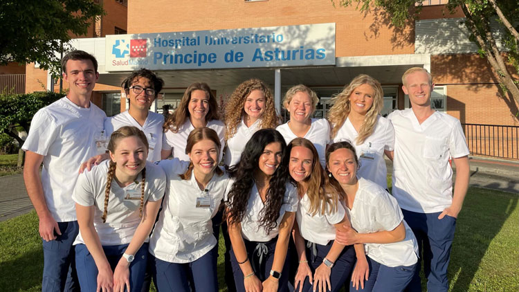 A group of BYU nursing students outside a hospital in Spain
