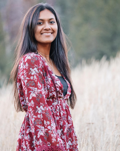 Photo of Ensign College student, Taya Russell, smiling. 