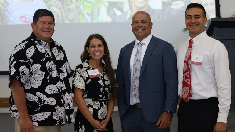 Four people at the BYU-Hawaii PLC, Mark Ellis, Sophia Rolie-Lopez, President John S.K. Kauwe III, and Kahia Walker