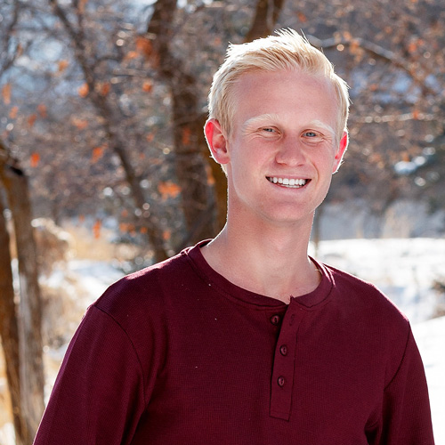 Alex Black, a recent BYU College of Nursing graduate, smiling.