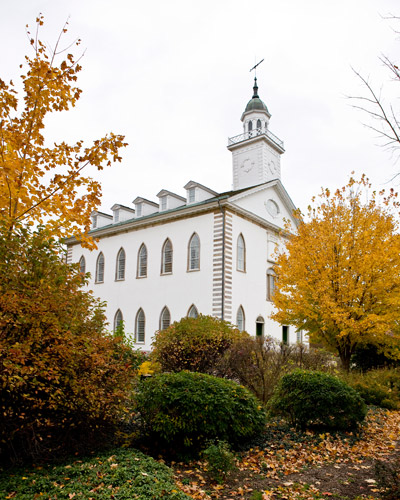 The Kirtland Temple with fall leaves and colors in front