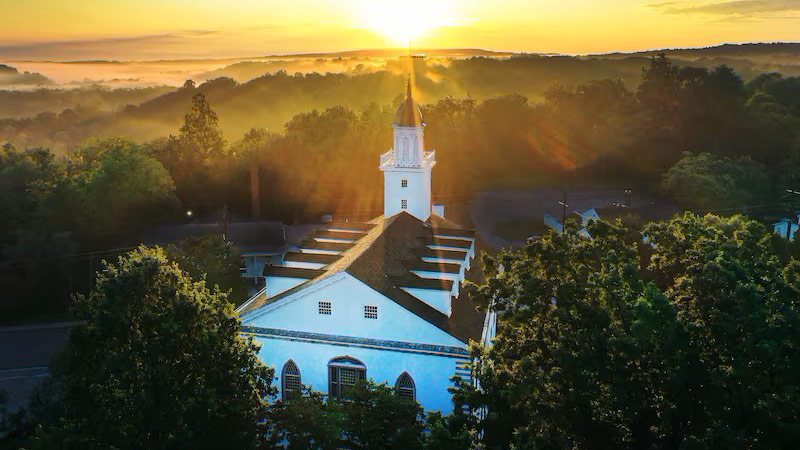 The Kirtland Temple facing the sunset