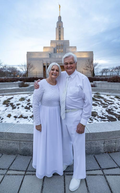 Blaine and Marcia Cutler in front of the temple.