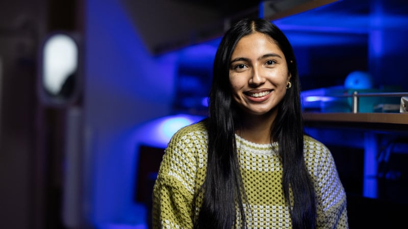 Portrait photo of Amy Hernandez in her research laboratory.