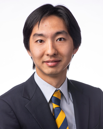 Yuto Takahashi, an Ensign College student, smiling.