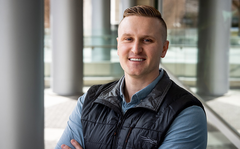 Benjamin Gruber smiling outside on BYU campus