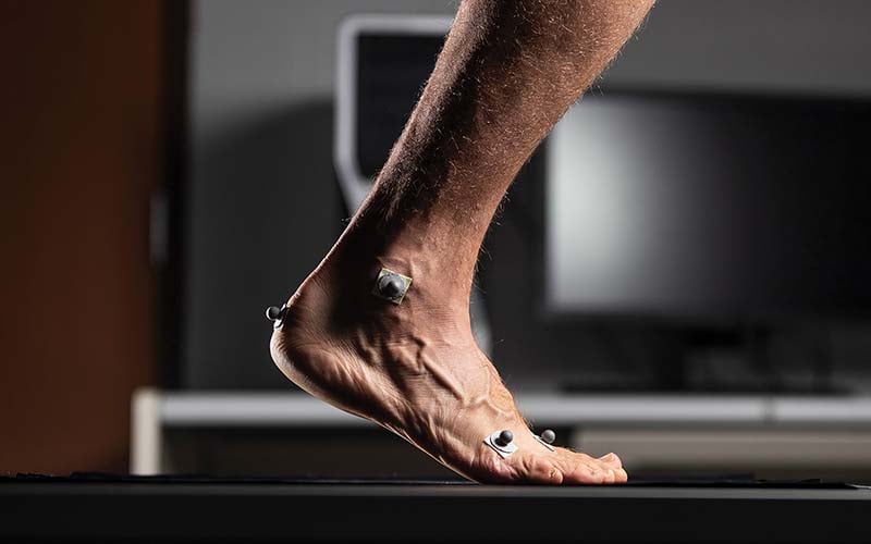 A human foot with several motion capture sensors.