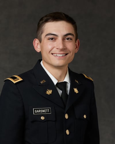 Young man in military uniform.