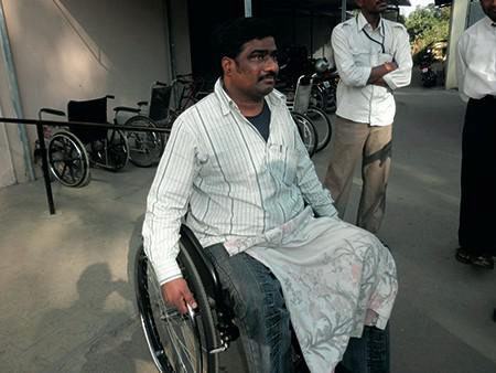 An Indian man in a Wheelchair