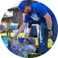 A BYU alumni drops off essential goods in Wyoming during a service project